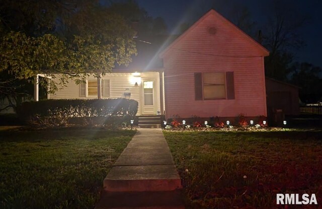 205 Texas St, Carterville, IL 62918 - view of front of home featuring a lawn