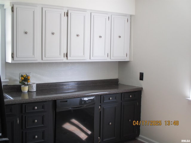 205 Texas St, Carterville, IL 62918 - kitchen featuring white cabinets, dark countertops, dishwasher, and dark cabinets