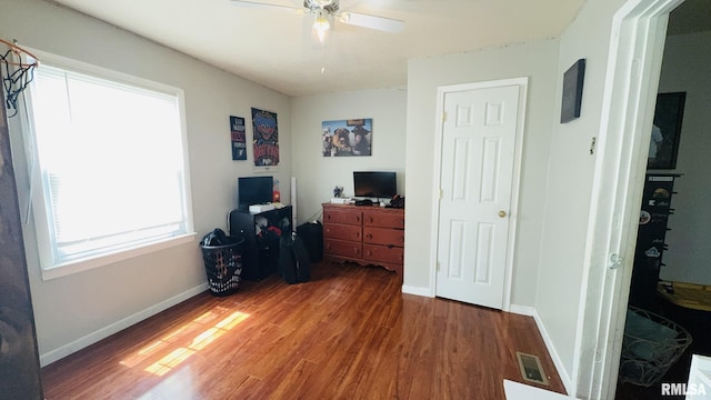 809 N 12th St, Herrin, IL 62948 - bedroom with wood finished floors, visible vents, baseboards, and ceiling fan