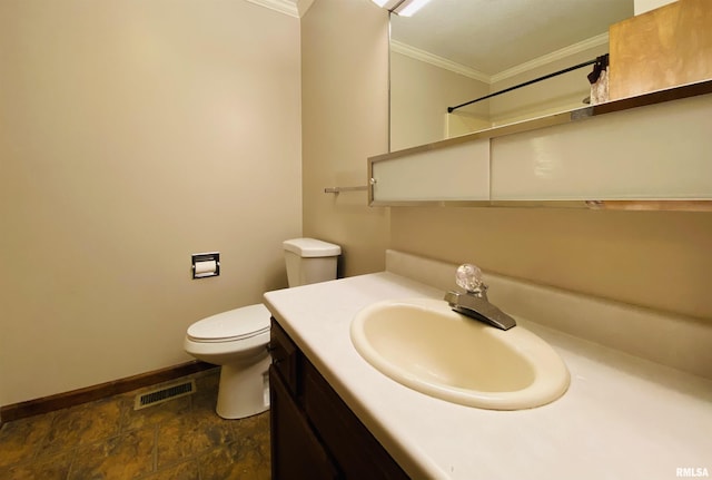 214 W Locust St, Harrisburg, IL 62946 - bathroom featuring baseboards, toilet, ornamental molding, stone finish floor, and visible vents