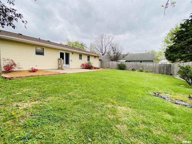 214 W Locust St, Harrisburg, IL 62946 - view of yard featuring a fenced backyard and a patio