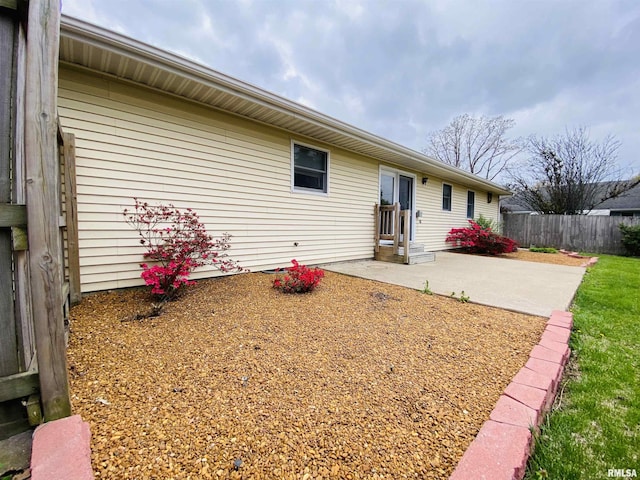214 W Locust St, Harrisburg, IL 62946 - exterior space featuring fence and a patio