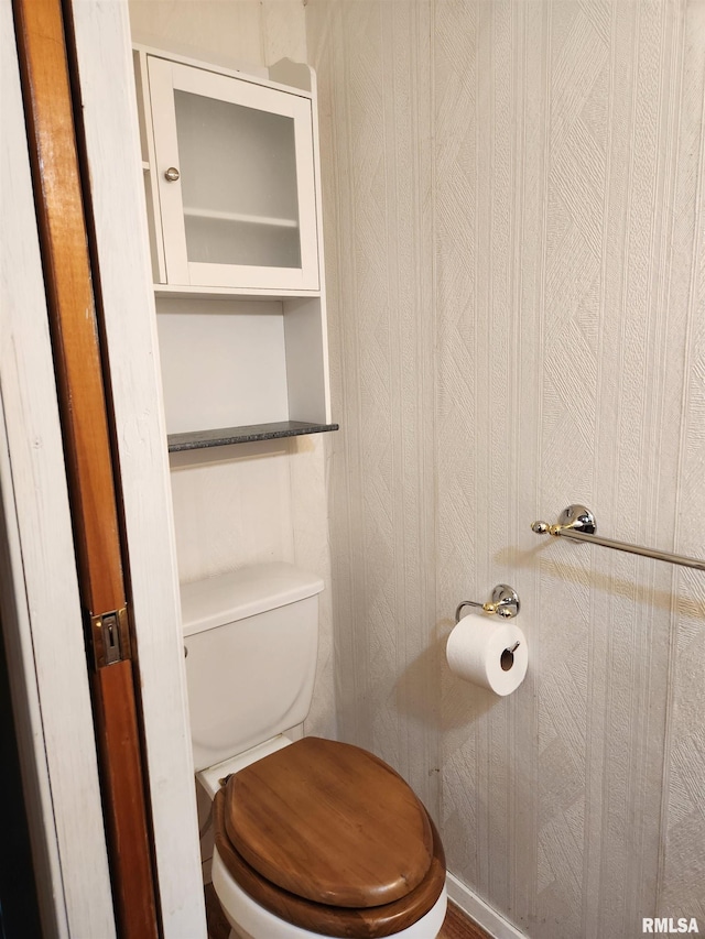 bathroom featuring toilet