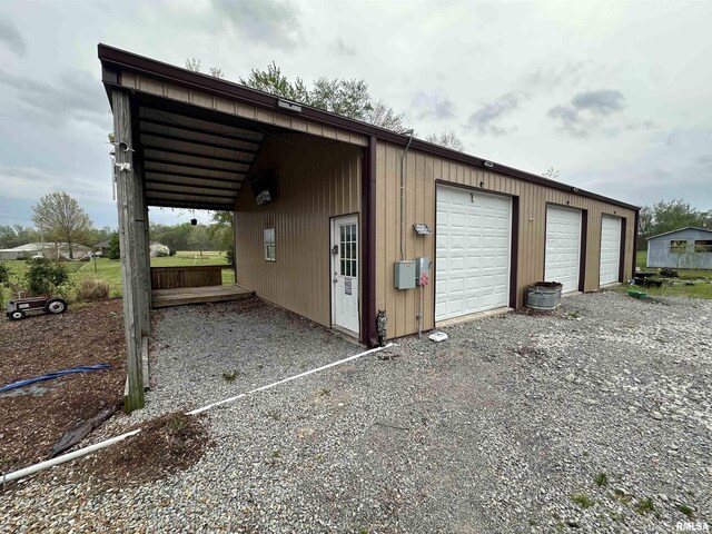 15 Lincoln St, Stonefort, IL 62987 - exterior space featuring gravel driveway and a carport