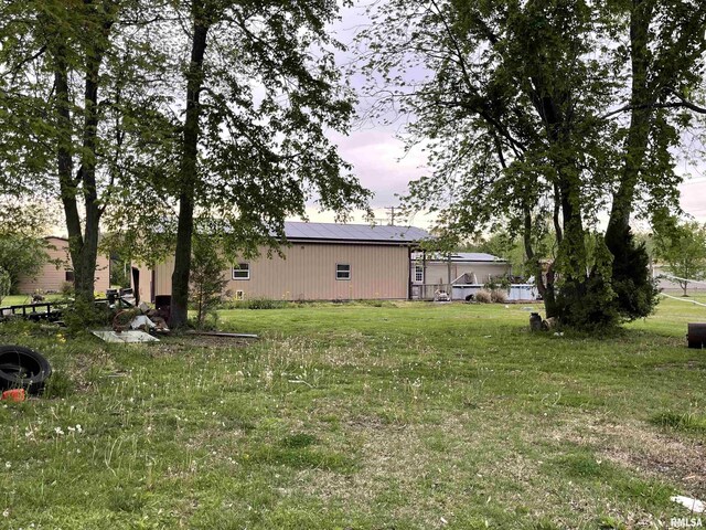 15 Lincoln St, Stonefort, IL 62987 - view of yard featuring an outdoor structure and a pole building