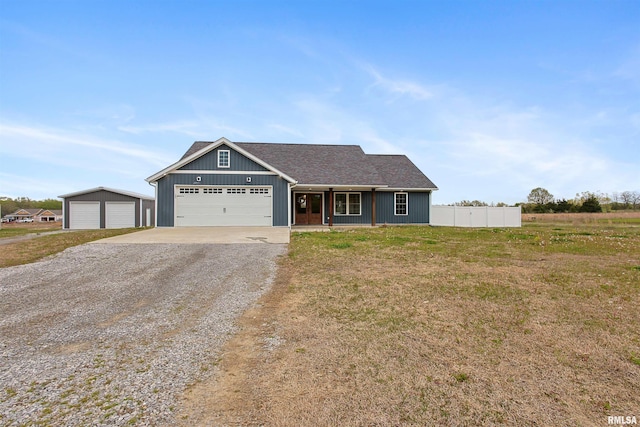 ranch-style house featuring driveway, a front lawn, and fence