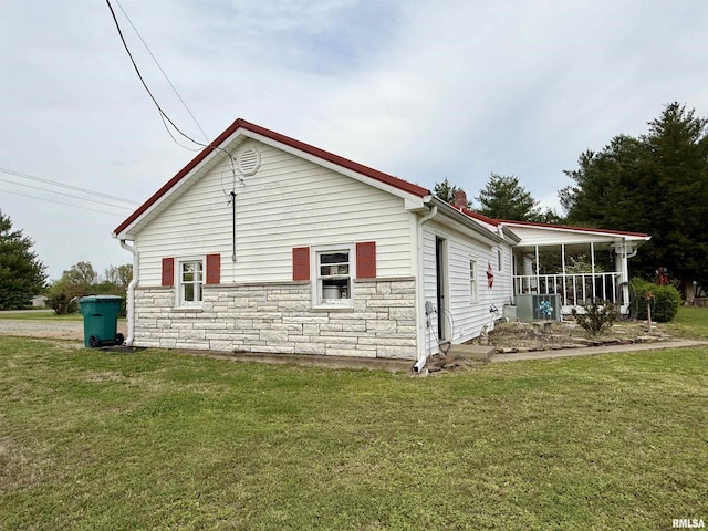 8806 Unionville Rd, Brookport, IL 62910 - view of side of property featuring a lawn and stone siding