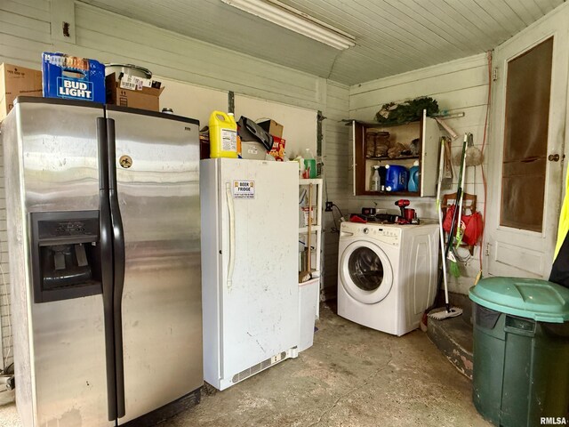 8806 Unionville Rd, Brookport, IL 62910 - clothes washing area featuring laundry area, wood walls, and washer / dryer