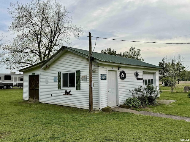 8806 Unionville Rd, Brookport, IL 62910 - view of home's exterior with a lawn