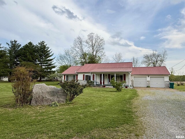 8806 Unionville Rd, Brookport, IL 62910 - ranch-style home featuring an attached garage, a front lawn, a porch, driveway, and metal roof