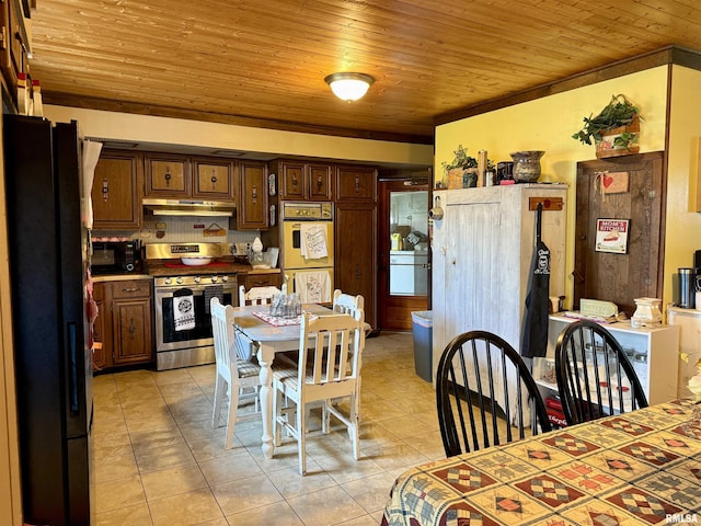 8806 Unionville Rd, Brookport, IL 62910 - kitchen featuring light tile patterned floors, wooden ceiling, black appliances, and under cabinet range hood