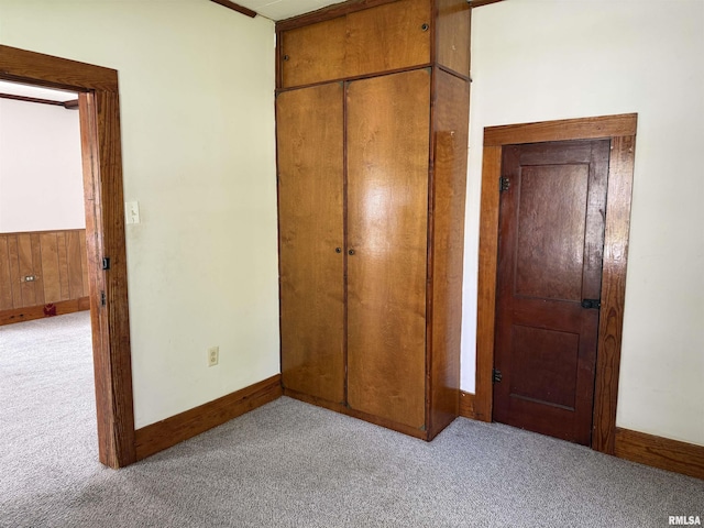531 N Bush Ave, Hurst, IL 62949 - unfurnished bedroom with carpet floors, a closet, and baseboards
