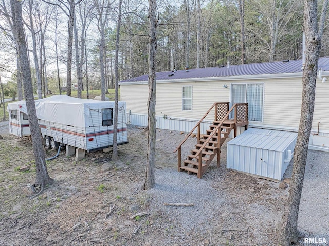 565 Dutton Chapel Rd, Golconda, IL 62938 - back of property featuring metal roof