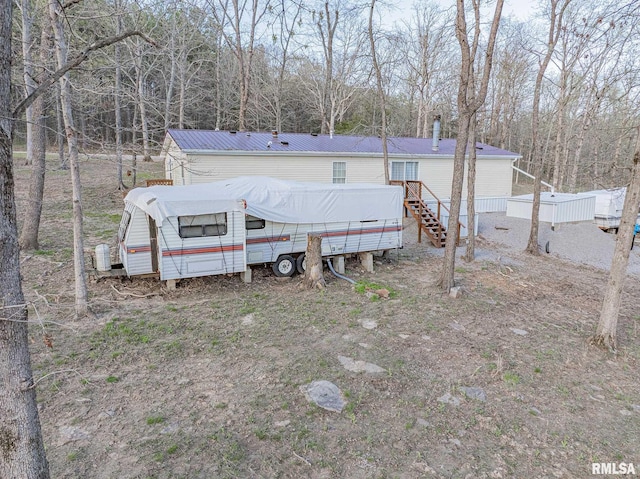 565 Dutton Chapel Rd, Golconda, IL 62938 - back of property featuring metal roof