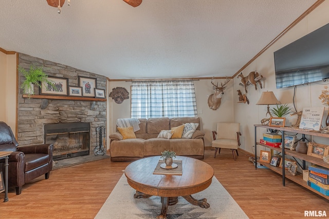 565 Dutton Chapel Rd, Golconda, IL 62938 - living area with ornamental molding, a textured ceiling, and light wood finished floors
