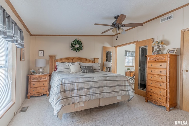 565 Dutton Chapel Rd, Golconda, IL 62938 - bedroom with carpet, visible vents, a ceiling fan, and ornamental molding