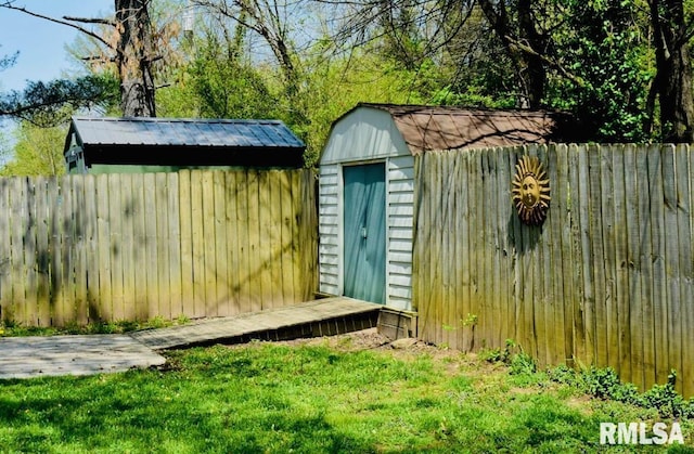 1001 S Emerald Ln, Carbondale, IL 62901 - view of shed with a fenced backyard