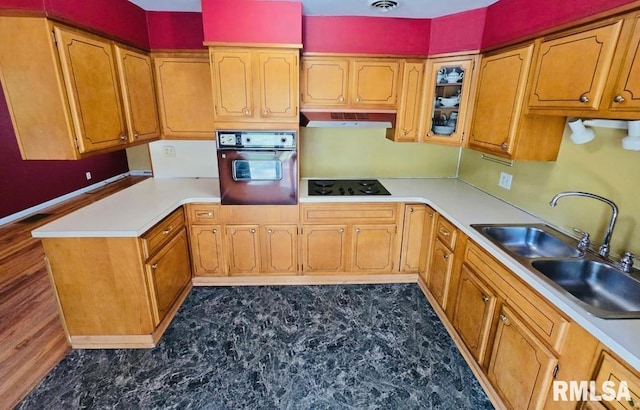 1001 S Emerald Ln, Carbondale, IL 62901 - kitchen featuring ventilation hood, a sink, wall oven, black electric stovetop, and a peninsula