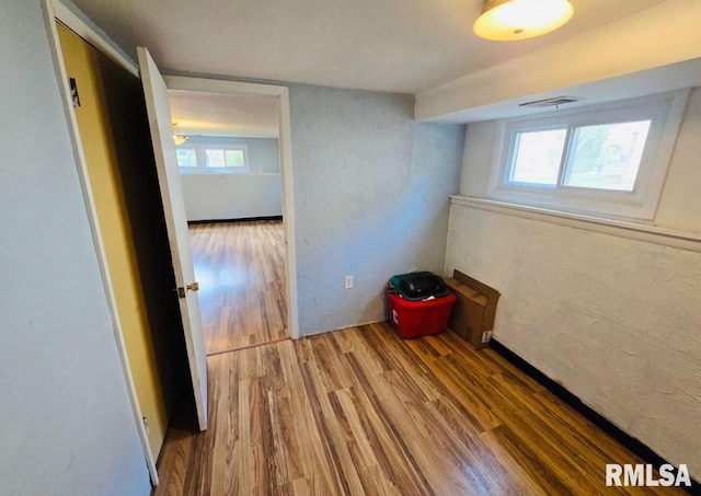 1001 S Emerald Ln, Carbondale, IL 62901 - spare room with wood finished floors and visible vents