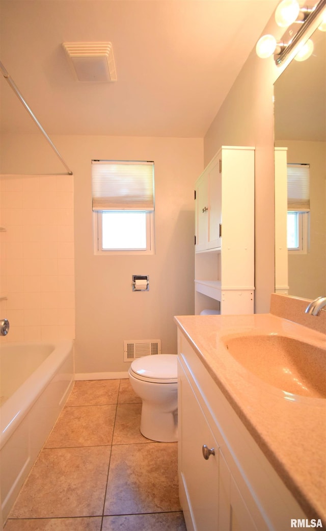 full bath featuring plenty of natural light, visible vents, tile patterned floors, and toilet