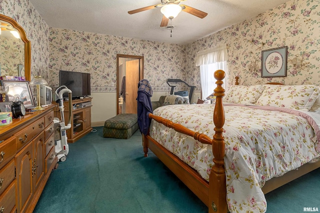 bedroom featuring wallpapered walls, carpet, a textured ceiling, and a ceiling fan