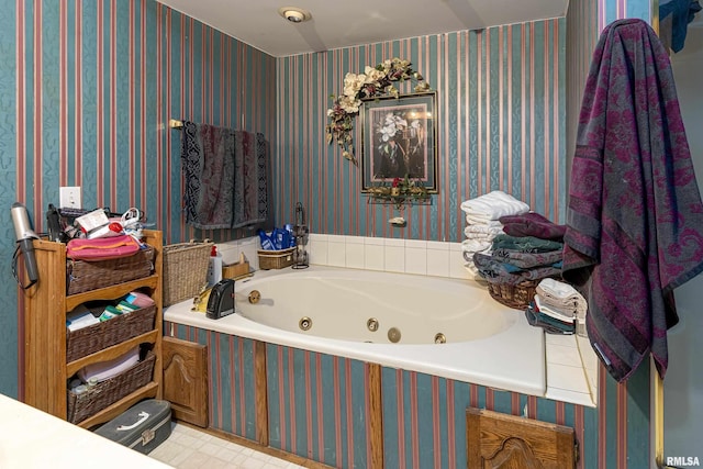 full bathroom with a whirlpool tub