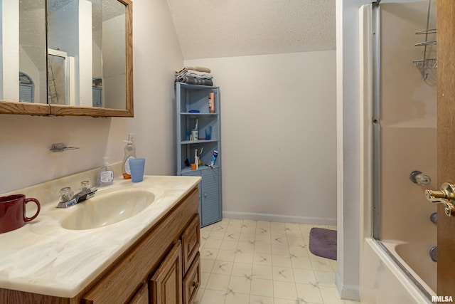 bathroom with tile patterned floors, a textured ceiling, lofted ceiling, vanity, and shower / tub combination
