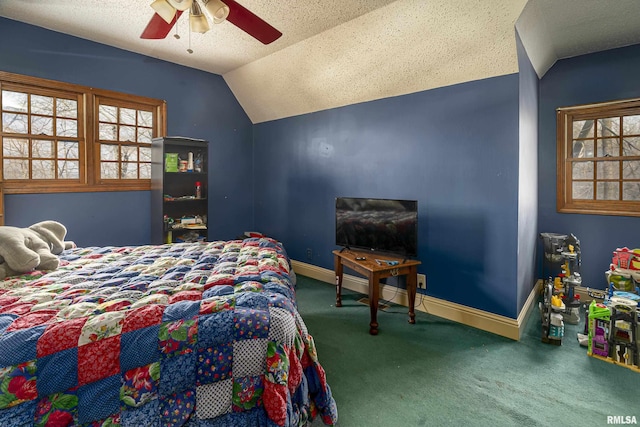 bedroom featuring vaulted ceiling, a textured ceiling, ceiling fan, carpet floors, and baseboards
