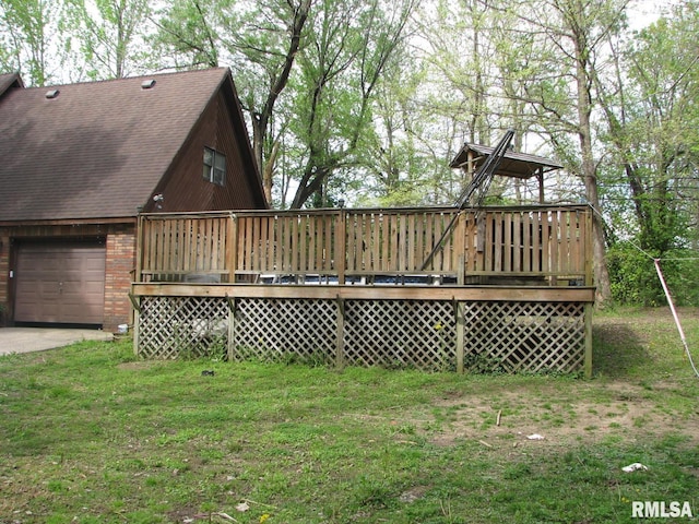 exterior space with concrete driveway and a garage