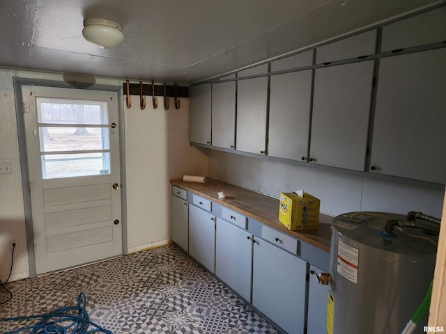 14625 E E Il Highway 15, Mount Vernon, IL 62864 - interior space with water heater and tile patterned floors