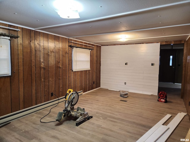 14625 E E Il Highway 15, Mount Vernon, IL 62864 - below grade area with baseboard heating, visible vents, wood finished floors, and wooden walls