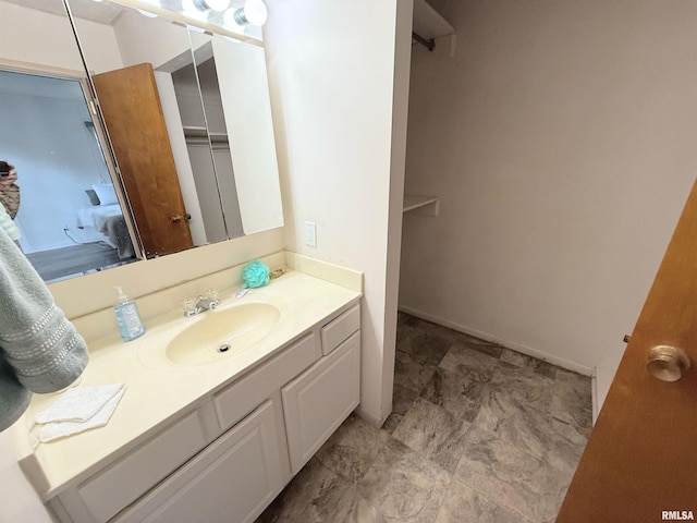 ensuite bathroom with vanity and ensuite bathroom