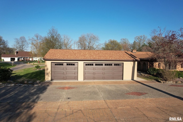 garage with driveway