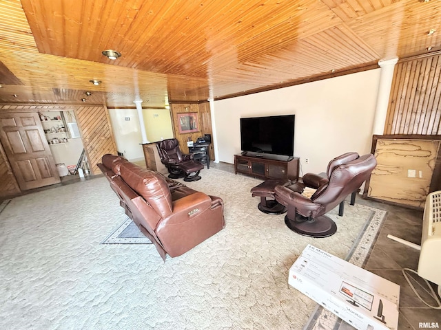 living room featuring wooden ceiling and wooden walls