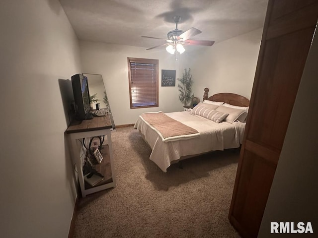bedroom featuring carpet and ceiling fan