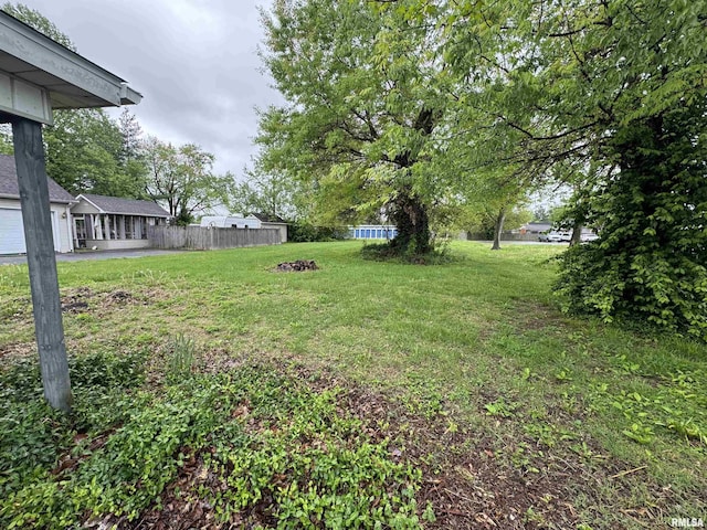 view of yard with fence