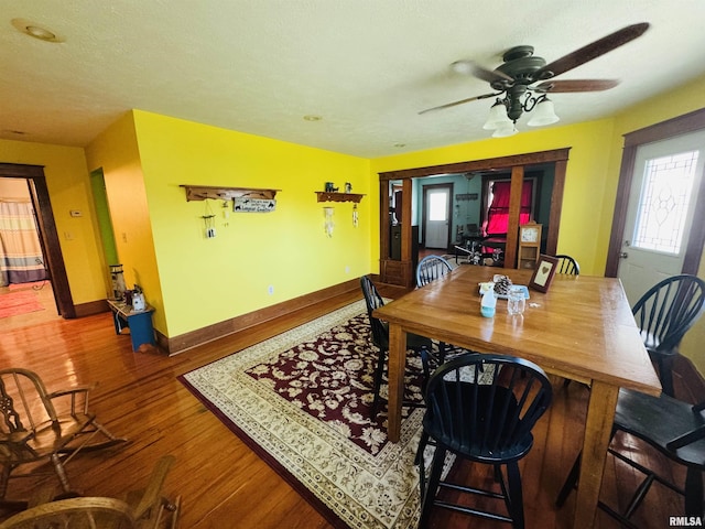 501 N Marion St, Salem, IL 62881 - dining room featuring baseboards, wood finished floors, and ceiling fan