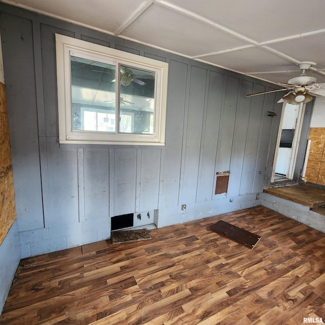 spare room featuring ceiling fan and wood finished floors