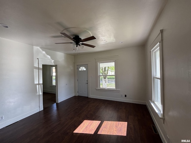 1014 E Broadway St, Centralia, IL 62801 - entryway with dark wood-style flooring, a ceiling fan, and baseboards