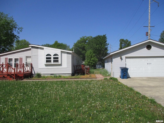 view of home's exterior featuring a yard, a wooden deck, crawl space, and a garage