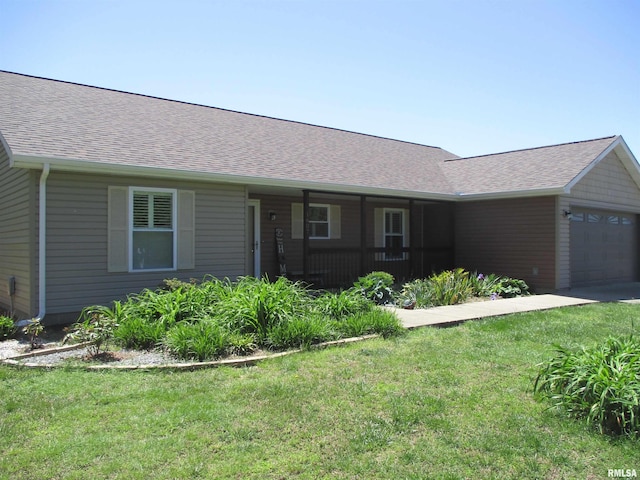 1607 Marion St, Carterville, IL 62918 - single story home with a front lawn, a shingled roof, a garage, and a porch