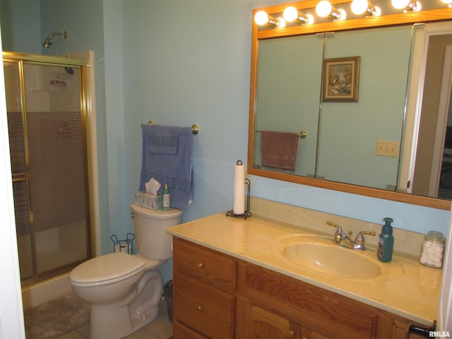 1607 Marion St, Carterville, IL 62918 - full bathroom with a stall shower, vanity, toilet, and tile patterned flooring