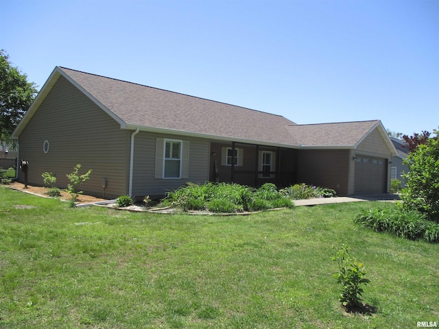 1607 Marion St, Carterville, IL 62918 - ranch-style house featuring a front lawn, a garage, and roof with shingles