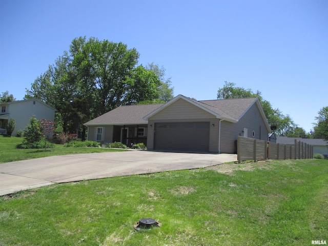 1607 Marion St, Carterville, IL 62918 - single story home with concrete driveway and a garage