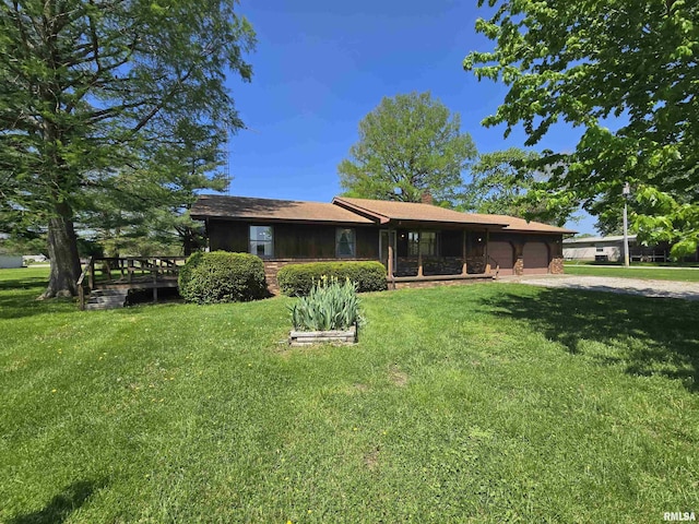 ranch-style house featuring a front lawn, a deck, a chimney, dirt driveway, and an attached garage