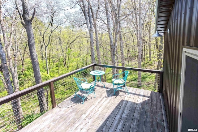 deck with a wooded view