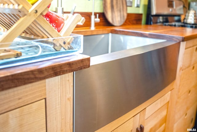 details featuring light brown cabinetry