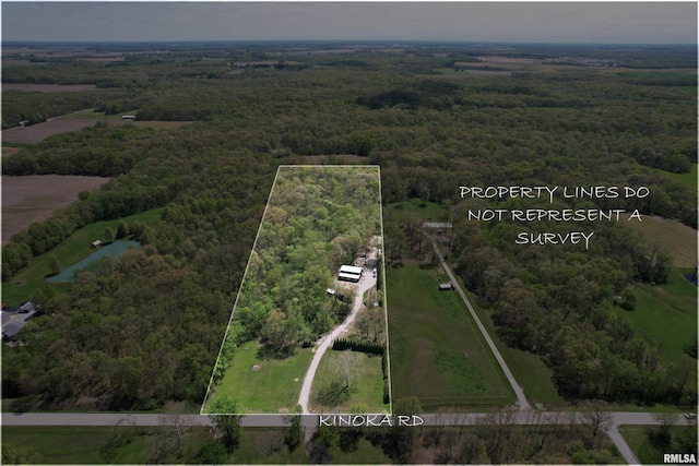 bird's eye view featuring a view of trees