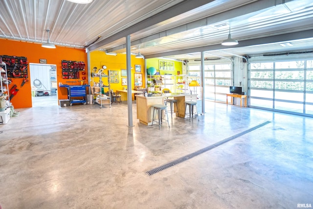 garage with a workshop area