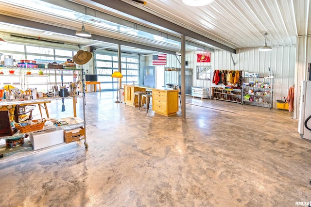 garage with a workshop area